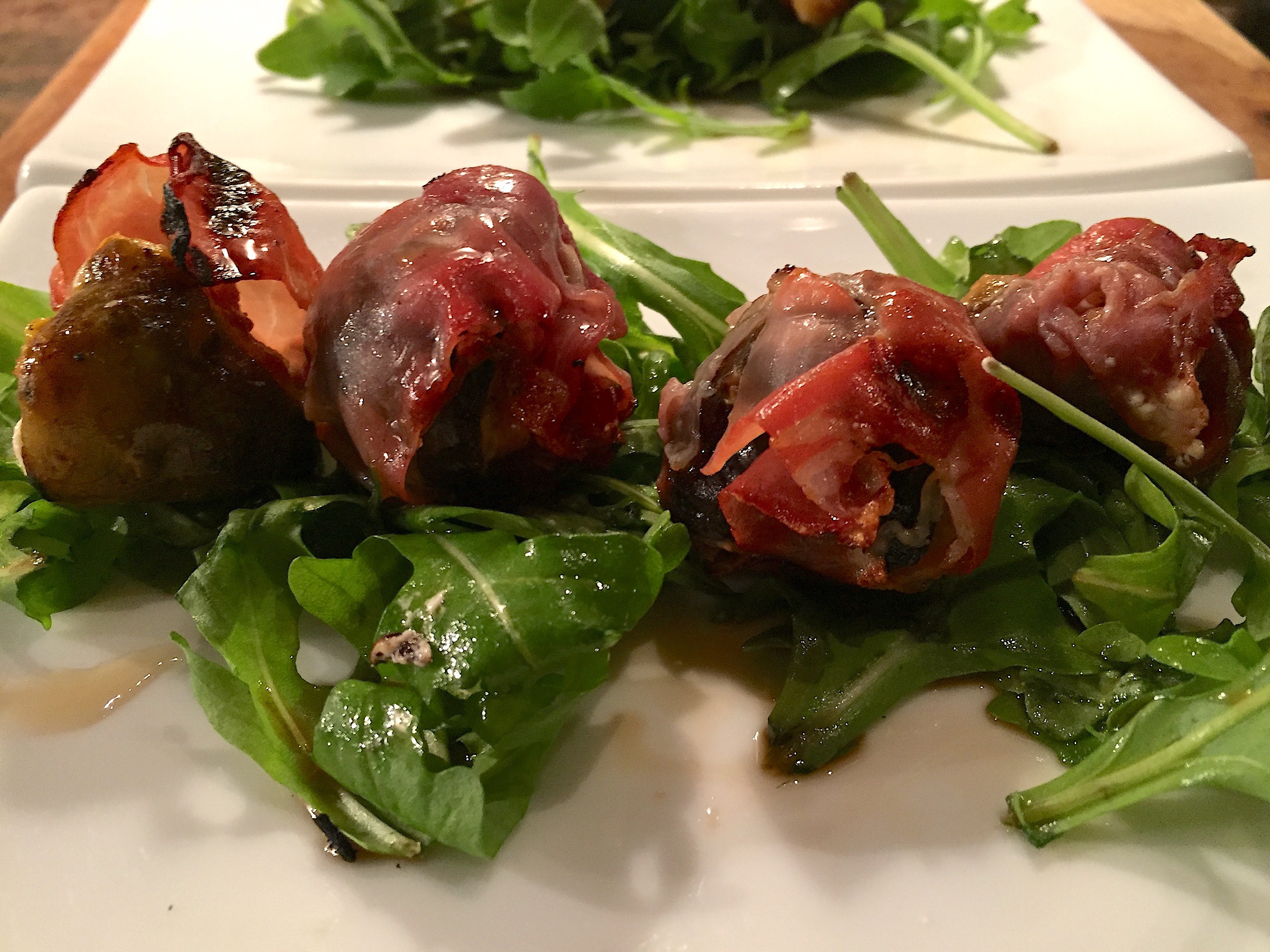 Figs and goat cheese wrapped in prosciutto